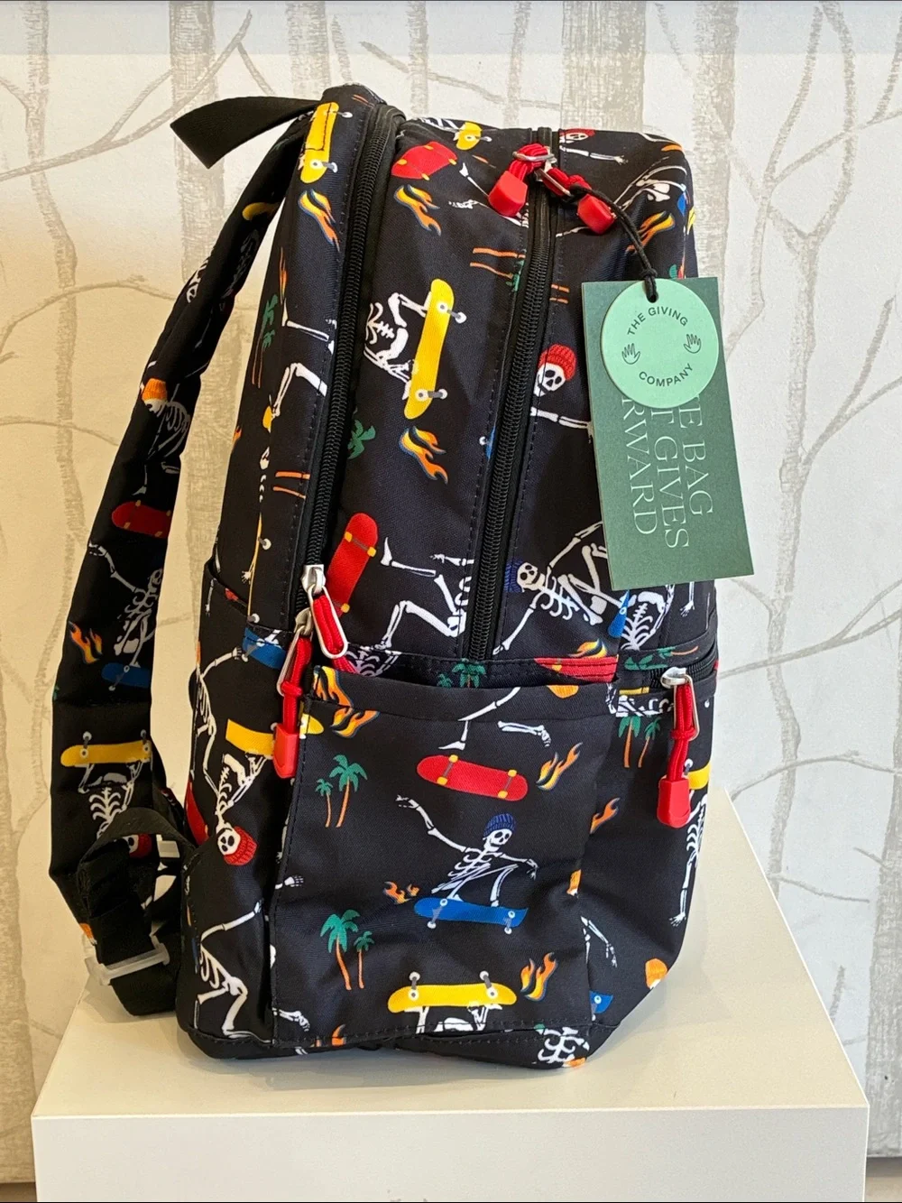 STATE Black Backpack with Multicolor Skate Skeleton Print